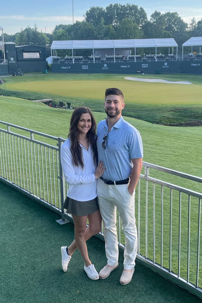 Samantha Large and her husband on a golf course