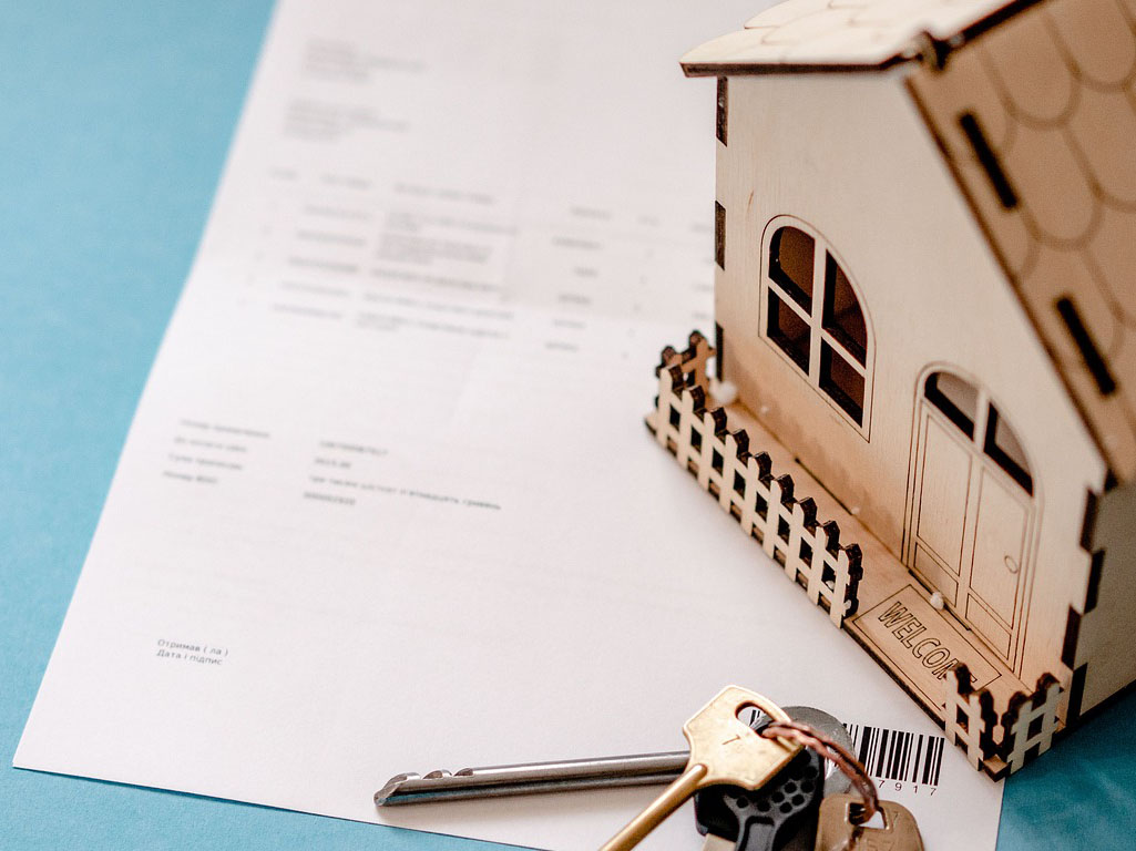 House with keys and paperwork