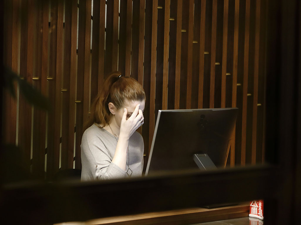 Worried woman at computer